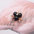 Schwarze Kunstperlenblume mit Goldbasis und Strasssteinen für DIY-Handwerk - Schwarz