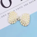 Detail of silver alloy bow charm with embedded pearls and sparkling rhinestones - Bowknot Pearl (Silver Base)