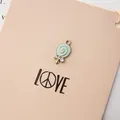 Mini light blue lollipop pendant in gold alloy with white rhinestones for DIY jewelry - Spiral Lollipop Style / Aquamarine