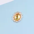 Golden oval alloy accessory with yellow gemstone and white rhinestones for DIY crafts - Champagne