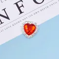 Sparkling heart-shaped rhinestone hair accessory with a large red gem center - Red