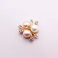 Detailed macro view of a floral alloy pendant featuring three pearls and six crystals - White Pink Orange Pearl Cluster (A412#)