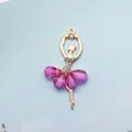 Golden ballet dancer charm with purple glitter skirt and white crystal accents - Purple (Gold Base)