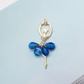 Golden ballet dancer pendant featuring dark blue crystal skirt and sparkling white rhinestones - Royal Blue (Gold Base)