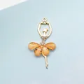 Golden ballet dancer charm with orange crystal skirt and white rhinestones decoration - Champagne (Gold Base)