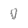 Close-up of a silver punk triangular earring with sharp cone rivets and polished finish - Steel
