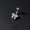 Macro detail of silver butterfly belly ring with sparkling cubic zirconia on dark surface - Bowknot Pave Style