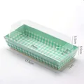 Detail view of rectangular sandwich cake box with green check base and clear plastic lid - Blue Long Style