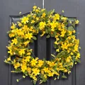 Vibrant yellow faux cosmos flower wreath with eucalyptus leaves on a dark wooden door - Yellow Cosmos Flower Wreath