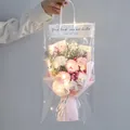 Pink and white soap carnation flower bouquet with LED lights in a transparent gift bag - Pink Carnation Bouquet with Transparent Bag