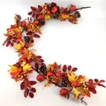Detail of autumn wreath with maple leaves, mini pumpkins, pine cones, and berries - Pumpkin Pine Cone Style