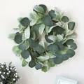 Green eucalyptus leaf wreath with two-tone foliage on natural rattan base hanging on white wall - 30*30*5cm / Leaf Rattan Wreath