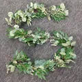 Artificial eucalyptus vine with white flowers for home wedding decor on dark grey background - Style C