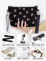 Black felt crossbody bag featuring pink bow pattern and adjustable shoulder strap - Black Pink Bow