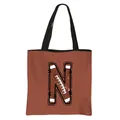 Bruine draagtas met letter N football print en zwarte handvaten voor studenten - Letter N Stijl(14)