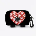 Black dog waste bag dispenser featuring a red heart and paw print with a metal hook - Black Red Heart Paw