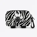 Portable dog waste bag dispenser in black and white zebra print with paw print detail - Black White Zebra