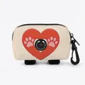 Beige dog waste bag dispenser with red heart print and convenient black plastic hook - Beige Heart Paw