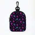 Portable dog treat pouch with colorful neon paw prints and clip-on hook in black finish - Black Neon Paw Oval Style