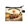 Close-up of retro mini coin purse featuring colorful vintage van and camper illustration - Field Sunset Camper Style