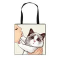 Polyester tote bag featuring a colorful girl and cat illustration with black straps - Ragdoll Cat Kissing Style (2)