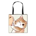 Beige polyester tote bag with printed illustration of a woman kissing a ginger cat - Orange Striped Cat Kissing Style (3)