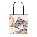 Polyester tote bag featuring a cute illustration of a girl kissing a grey tabby cat - Grey Tabby Cat Kissing Style (6)