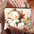 Detail of cartoon cat makeup bag showing practical use with cosmetics brushes inside - Proud Princess