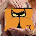 Trousse à maquillage en toile orange avec motif chat et fermeture éclair noire - Chat en Colère
