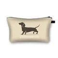 Cream-colored dachshund silhouette makeup bag with black zipper and webbing handle - Dachshund Silhouette with DACHSHUND Text (3)