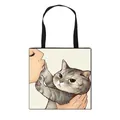 Polyester tote bag featuring artistic illustration of person kissing a grey tabby cat - Grey Tiger Striped Cat Kissing Style (10)