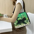 Fashionable crossbody tote bag featuring a black cat walking on piano keys illustration - Cat on Piano Keys (10)
