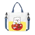 White canvas tote bag featuring a cartoon bear print with blue handles and crossbody strap - Xiangsiqiao Style