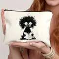 Cream canvas zipper makeup bag featuring a cute black dog reading a book illustration - Reading Black Dog (6)