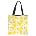 Floral print large capacity tote bag with yellow daffodil patterns and black handles - Off-white Yellow White Daffodil Print