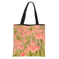Floral canvas tote bag with pink tulip art and black shoulder straps for shopping - Pink Flower Sea