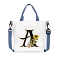 Borsa tote in tela bianca con lettera A di girasole e tracolla blu regolabile in altezza - Lettera A(A01)