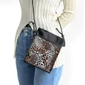 Leopard print crossbody phone bag with black panel and adjustable strap detail - Brown and Black Spliced Leopard