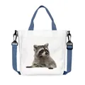 White canvas crossbody bag with raccoon print and navy blue adjustable straps - Grey