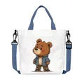 Borsa in tela bianca con stampa di orsetto e tracolla blu regolabile - Stile Orso in Giacca Blu con Cappuccio (15)