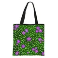 Floral print tote bag with purple flower pattern and black canvas straps - White Background Purple Small Flower Print