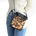 Leopard and butterfly print crossbody phone bag with orange accents and black drawstring strap - Orange Black White Butterfly Print
