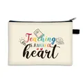 Canvas makeup bag for teachers with heart text print in cream white finish - Work of Heart Slogan (08)