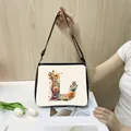 Cream tote bag featuring colorful floral letter L design with adjustable black strap - S / L12 (Letter L)