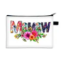 White floral letter MAMAW makeup bag with black zipper and hanging strap for travel - MAMAW Floral Style