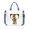 White canvas tote bag with sunflower letter T print and blue adjustable shoulder strap - Letter T(T20)