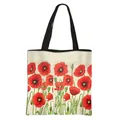 Floral canvas tote bag featuring red poppy print and black straps for daily use - Red Poppy Pattern (1)