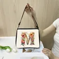 Off-white tote bag with floral letter M print and adjustable black shoulder strap - M13 (Letter M)