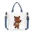 Borsa in tela bianca con orso, manici blu scuro e tracolla in nylon regolabile - Stile Orso in Maglione con Lettere Dance (08)