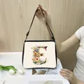 Cream tote bag featuring a large floral letter E design with adjustable strap - E05 (Letter E)